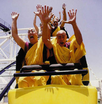 Buddhist Monks on a Roller Coaster